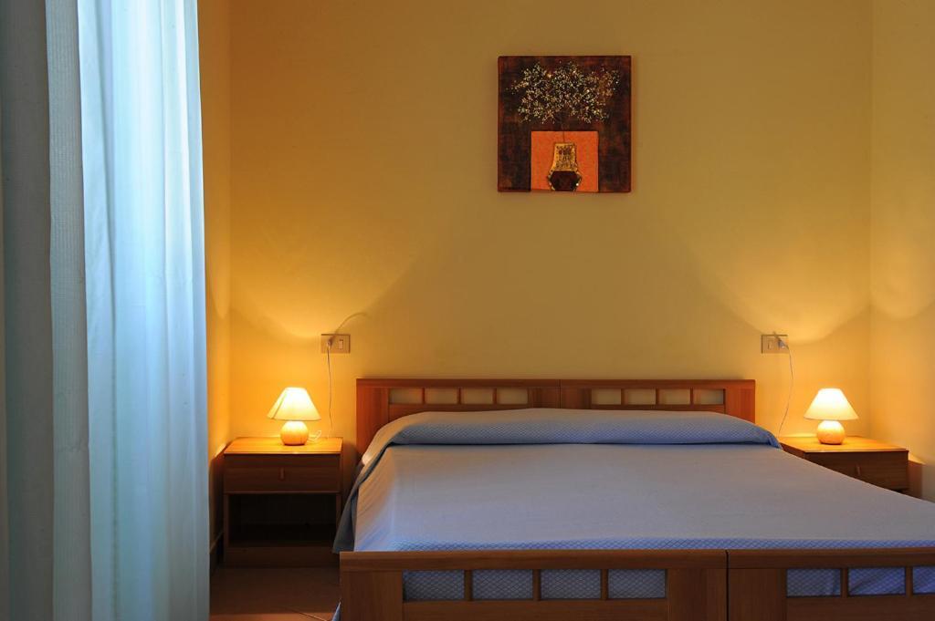 Sporting Hotel Stella Maris Bosa Marina Quarto foto